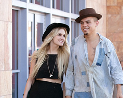 Ashlee Simpson in his and hers fedoras